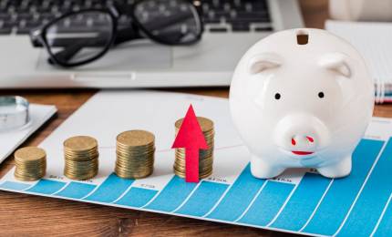 piggy-bank-and-growth-chart-with-coins-and-laptop_23-2148780582.jpg